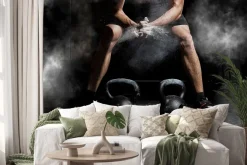 Naklejka: Mężczyzna szykujący się do podnoszenia ciężarów