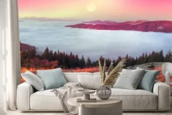 Naklejka: Mgła unosząca się nad górską doliną