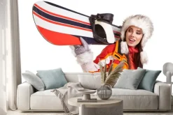 Naklejka: Młoda kobieta stojąca z snowboard izolowane na białym