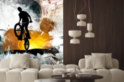 Naklejka: Młody męski skoczek rowerowy. zdrowy tryb życia