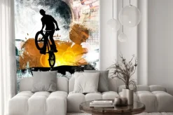 Naklejka: Młody męski skoczek rowerowy. zdrowy tryb życia