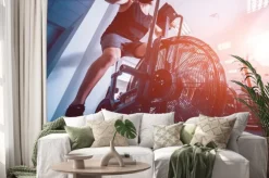 Naklejka: Młodzi mężczyźni z muskularnym ciałem za pomocą roweru powietrznego