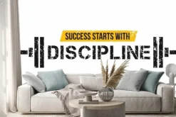 Naklejka: Motywacyjny cytat ze sztangą w tle