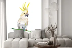 Naklejka: Żółta papuga kakadu na zielonej gałęzi