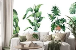 Naklejka: Watercolor image with tropical leaves and leaves of indoor plants.
