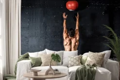 Naklejka: Young strong sweaty focused fit muscular man with big muscles