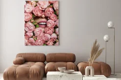 Obraz: A female smile with beautiful teeth and pink lipstick is covered