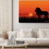 Obraz: Afrykański krajobraz z lwa zwierząt sylwetki. savanna tle zachodu