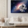 Obraz: Astronauta w kosmosie na tle galaktyki