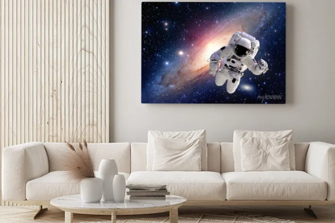 Obraz: Astronauta w kosmosie na tle galaktyki