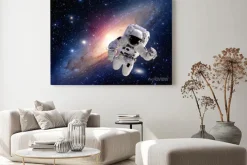 Obraz: Astronauta w kosmosie na tle galaktyki