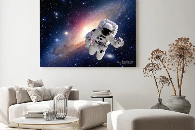 Obraz: Astronauta w kosmosie na tle galaktyki
