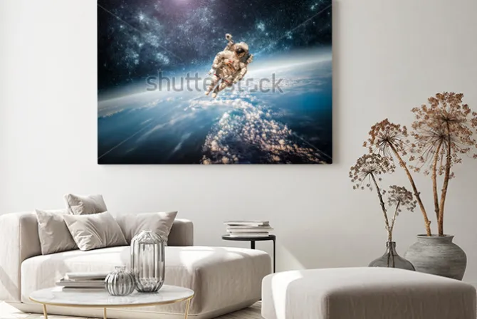 Obraz: Astronauta w przestrzeni kosmicznej na tle ziemi