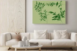 Obraz: Bambusowe gałązki na pustym zielonym tle