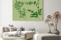 Obraz: Bambusowe gałązki na pustym zielonym tle