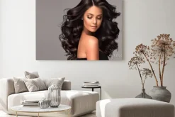 Obraz: Beauty brunette girl with long and shiny wavy black hair .