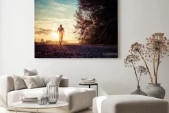 Obraz: Biegacz na ścieżce o wschodzie słońca