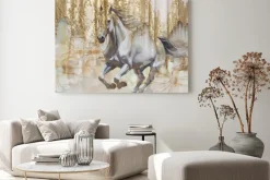 Obraz: Biegnący biały koń na tle złotej farby