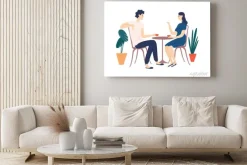 Obraz: Cute couple sitting at table, drinking tea or coffee and talking.