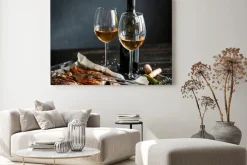 Obraz: Dinner concept for two. two glasses of white wine, baked fish.