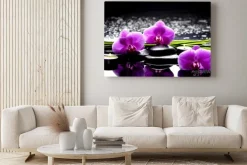 Obraz: Fioletowe storczyki z kamieniami i świeczkami