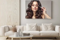 Obraz: Makeup artist applies eye shadow . beautiful woman with make-up