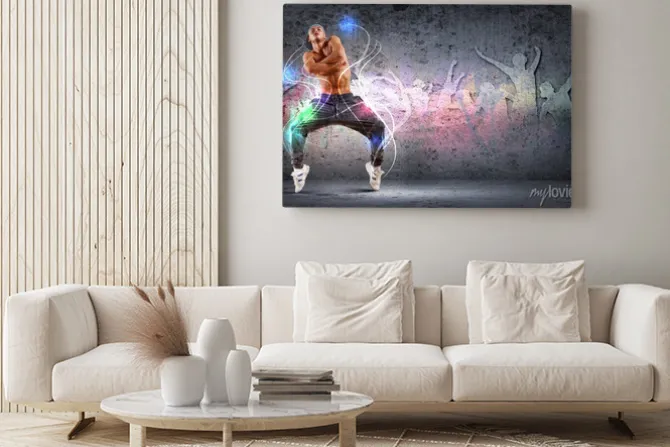 Obraz: Mężczyzna tańczący hip hop w kompozycji z neonowymi liniami