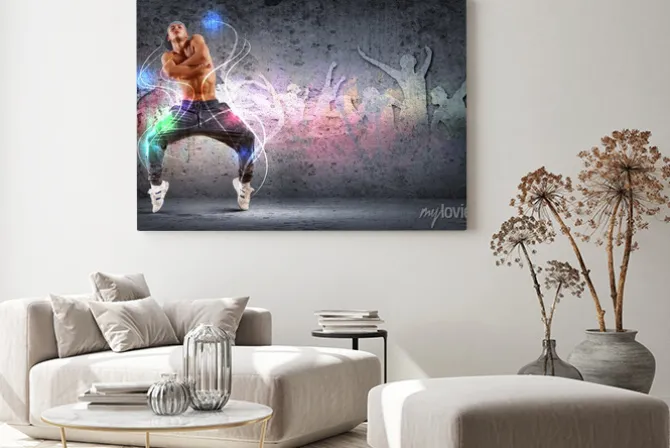 Obraz: Mężczyzna tańczący hip hop w kompozycji z neonowymi liniami