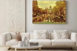 Obraz: Most w amsterdamie miejski krajobraz z rowerami