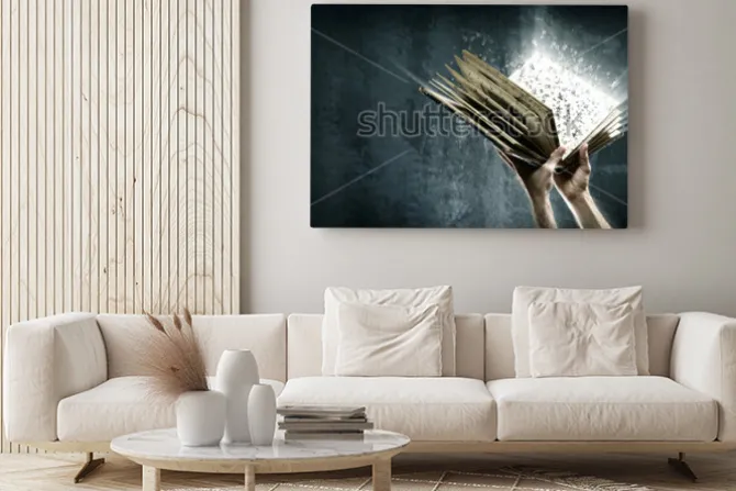 Obraz: Otwarta magiczna książka z magicznymi światłami