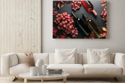 Obraz: Overhead view on assortment of wine bottles lying down on a dark