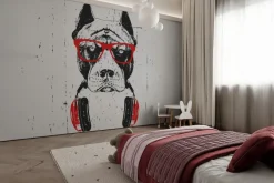 Obraz: Pies w okularach przeciwsłonecznych z słuchawkami