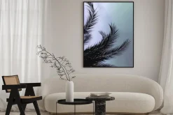 Plakat: Czarne liście palmy na tle nieba