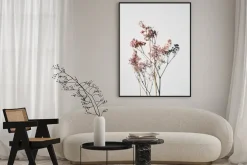 Plakat: Dried wild flowers on white table background top view.