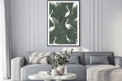 Plakat: Eleganckie żurawie w otoczeniu zielonych liści