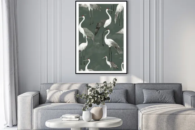 Plakat: Eleganckie żurawie w otoczeniu zielonych liści