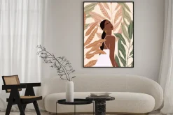 Plakat: Kobieta wśród dużych tropikalnych liści ilustracja
