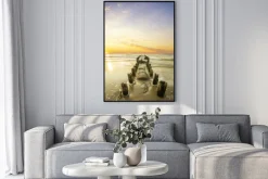 Plakat: Krajobraz morski-falochron i zachód słońca