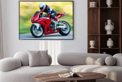 Plakat: Motocyklista jadący na motorze