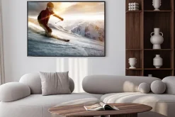 Plakat: Narciarz w otoczeniu słońca