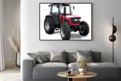 Plakat: New red tractor isolated on white background