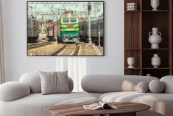 Plakat: Passenger trains move on the station at day time.