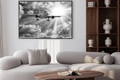 Plakat: Samolot pasażerski na tle słonecznego nieba