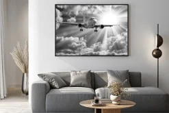 Plakat: Samolot pasażerski na tle słonecznego nieba