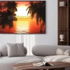 Plakat: Sea sunset among the palm trees, the sun over the water in the