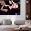 Plakat: Sexy woman in black dress posing in luxurious interior