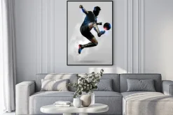 Plakat: Sylwetka piłkarza wykonującego przewrotkę