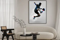 Plakat: Sylwetka piłkarza wykonującego przewrotkę
