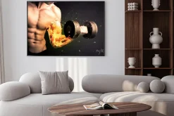 Plakat: Umięśniony mężczyzna dźwigający sztangę