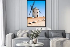 Plakat: Wiatrak na tle błękitnego nieba